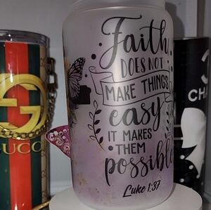 Handcrafted glass tumbler with lid decorated.